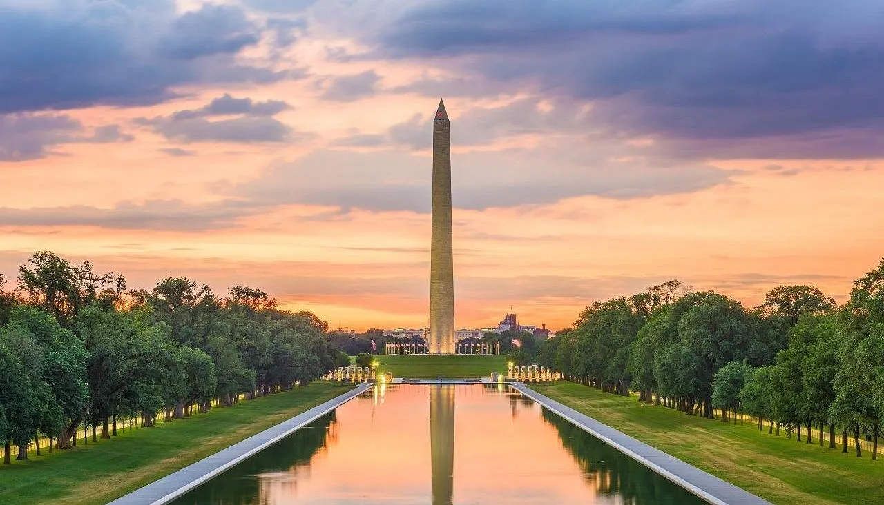 Washington Monument reflected in the Reflecting Pool at sunset