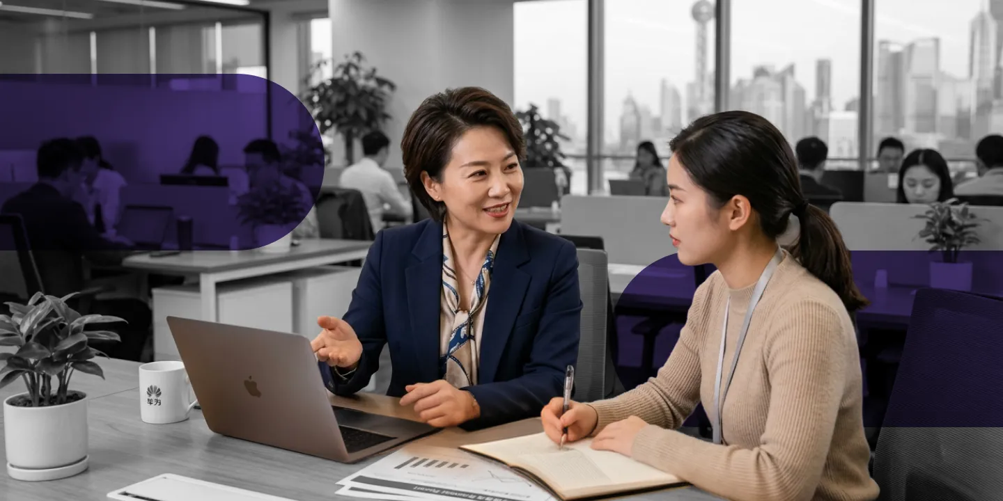 Two professionals collaborating in a modern office environment
