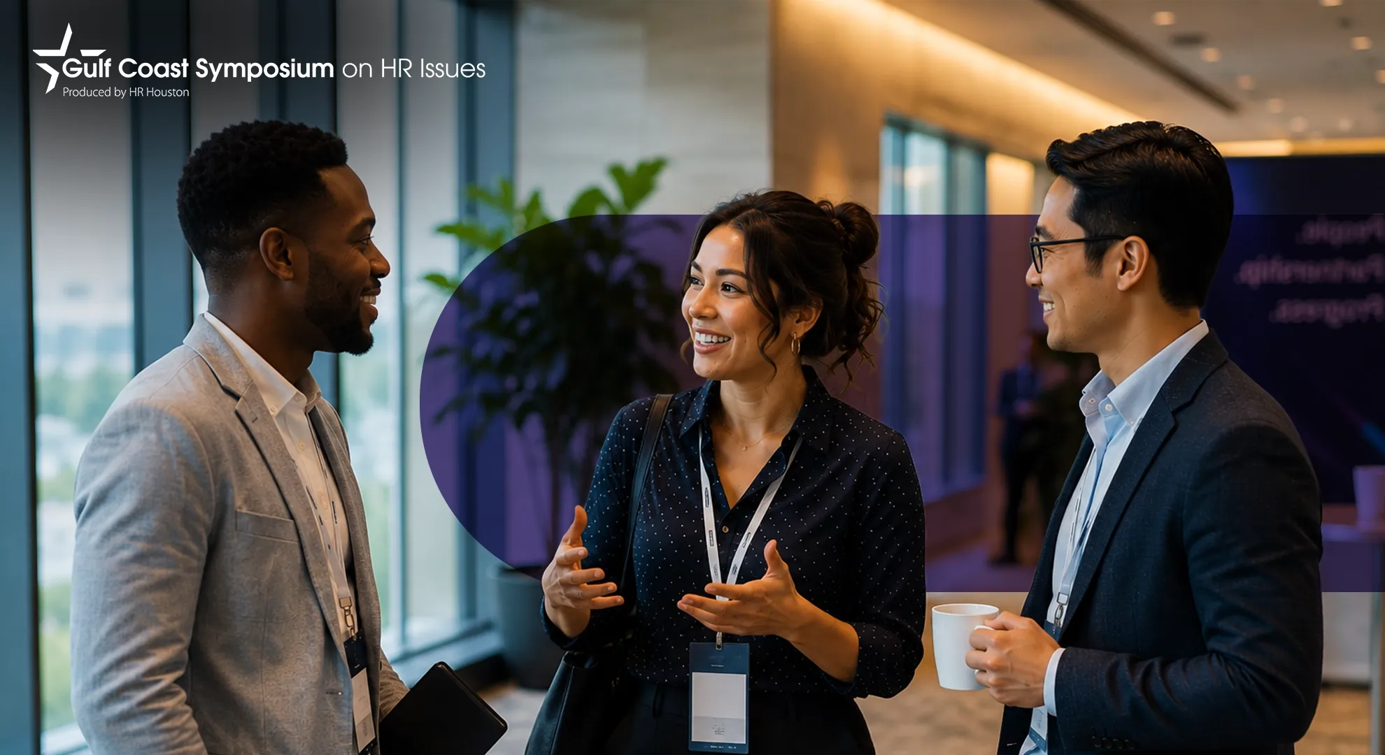Three diverse professionals engaging in lively conversation at a HR symposium event.