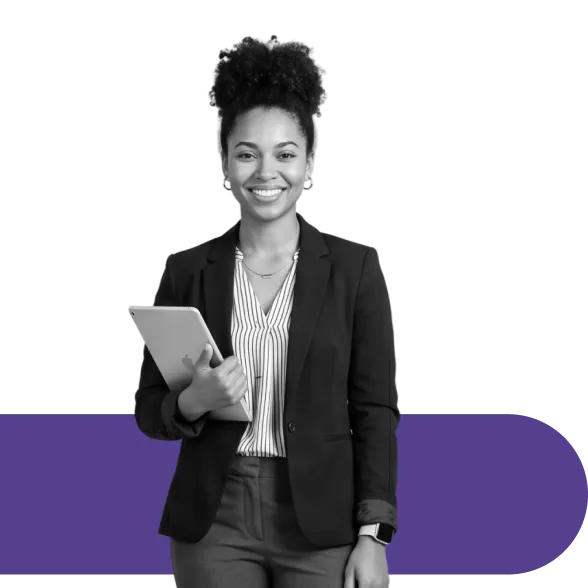 Smiling professional woman holding a tablet, looking confidently at the viewer.